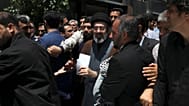 Mojtaba Khamenei középen