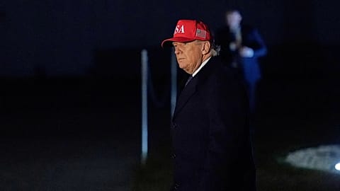 President Donald Trump waves after arriving on Marine One on the South Lawn of White House, Sunday, March 1, 2026, in Washington. (AP Photo/JMark Schiefelbein)
