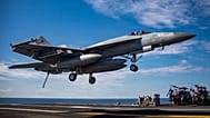 Aircraft attached Strike Fighter Squadron 37, lands on the flight deck of the world's largest aircraft carrier while operating in support of Operation Epic Fury, March 1, 20