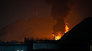 Large fire and plume of smoke is visible after, according to the authorities, debris of an Iranian intercepted drone hit the Fujairah oil facility, in Fujairah, UAE.