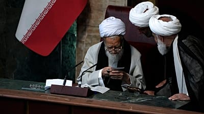 FILE: Ayatollah Mohammad Ali Movahedi Kermani reads a note during the first session of Assembly of Experts after a vote that decided the new assembly in Tehran, 21 May 2024