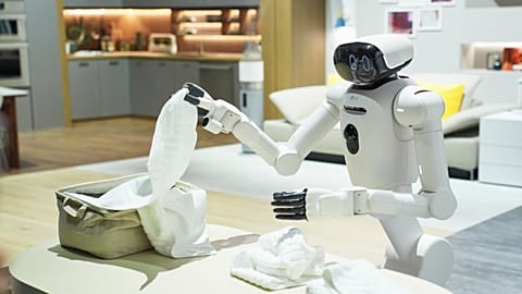 An LG CLOiD robot folds laundry at the LG Electronics booth during the CES tech show Tuesday, Jan. 6, 2026, in Las Vegas. 
