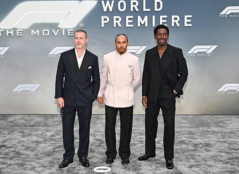 FILE: Brad Pitt, Lewis Hamilton, and Damson Idris attend the world premiere of "F1: The Movie" in New York, U.S., 2025.