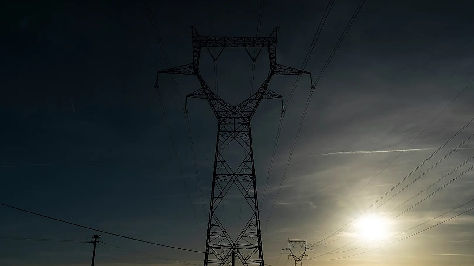 Electricity poles in the countryside outside Lyon, central France.