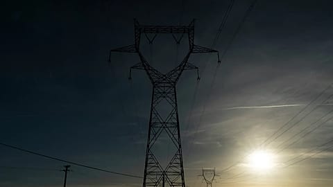 Electricity poles in the countryside outside Lyon, central France.