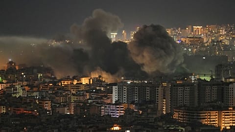 Smoke rises following an Israeli airstrike in the Dahiyeh area of Beirut, Thursday, March 5, 2026