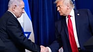 President Donald Trump shakes hands with Israel's Prime Minister Benjamin Netanyahu during a news conference at Mar-a-Lago, Dec. 29, 2025, in Palm Beach, Fla.