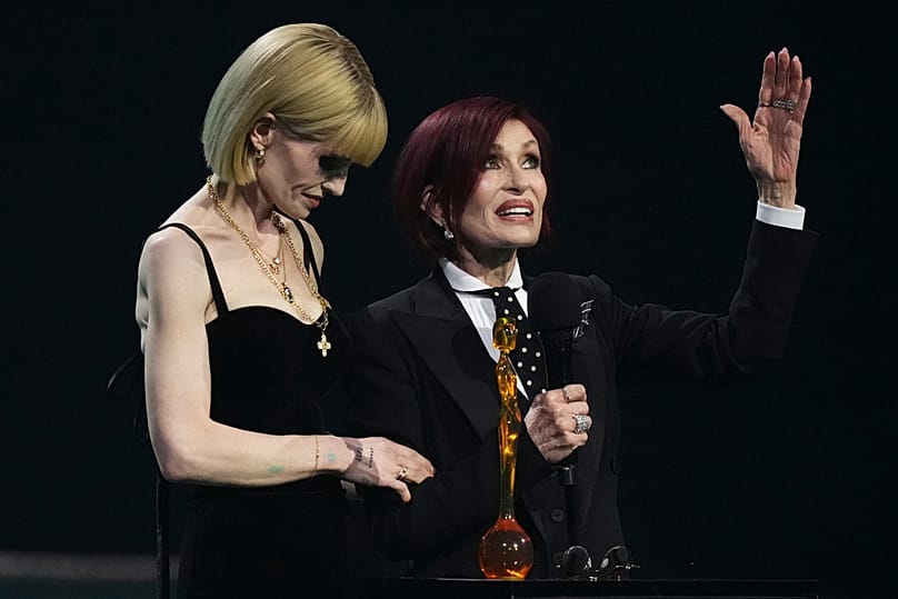 Kelly Osbourne and Sharon Osbourne speak on stage during the Brit Awards 2026 