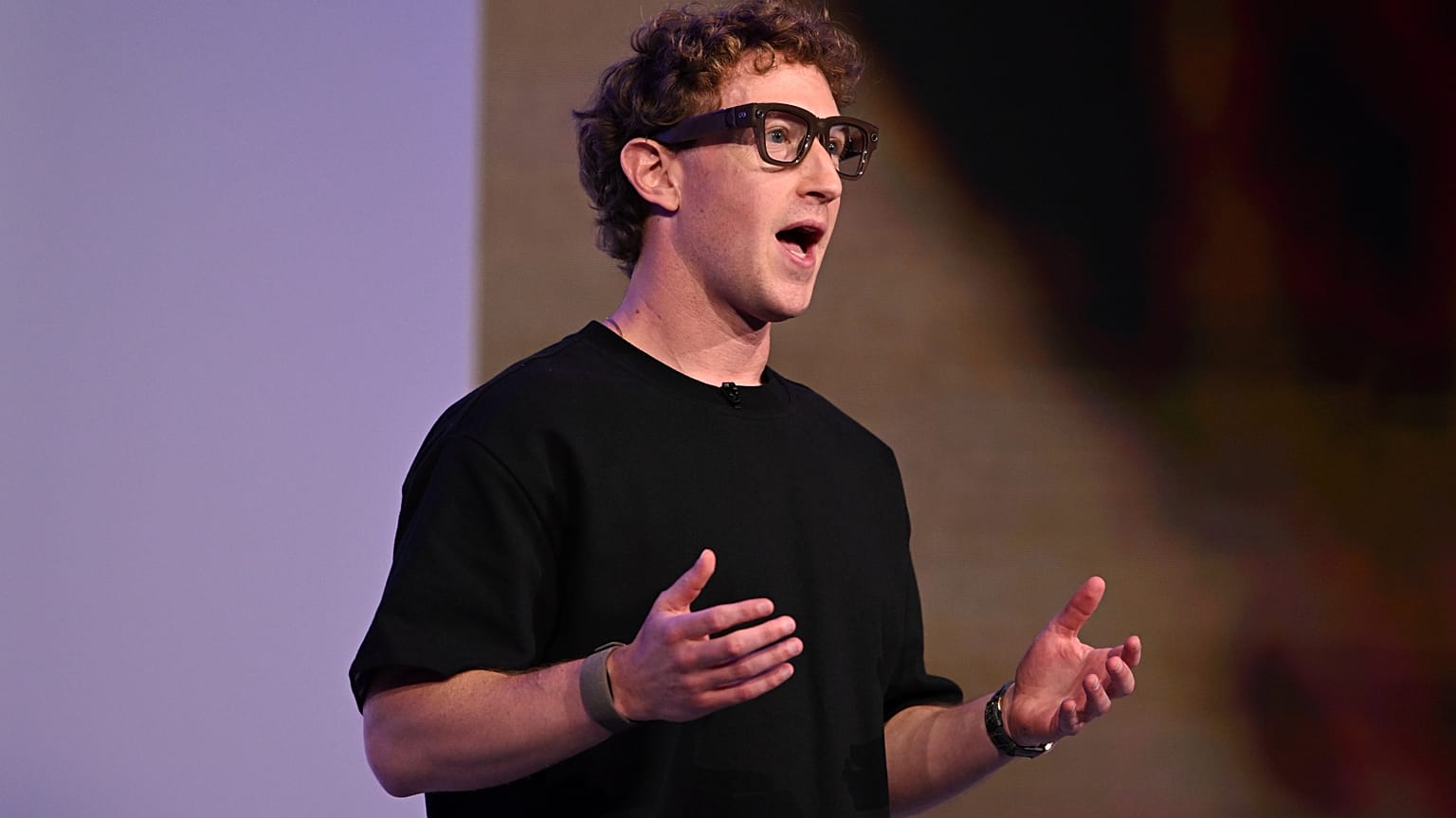 Meta CEO Mark Zuckerberg wears artificial intelligence-powered smart glasses as he speaks during the company's Connect developer conference Wednesday, Sept. 17 2025. 