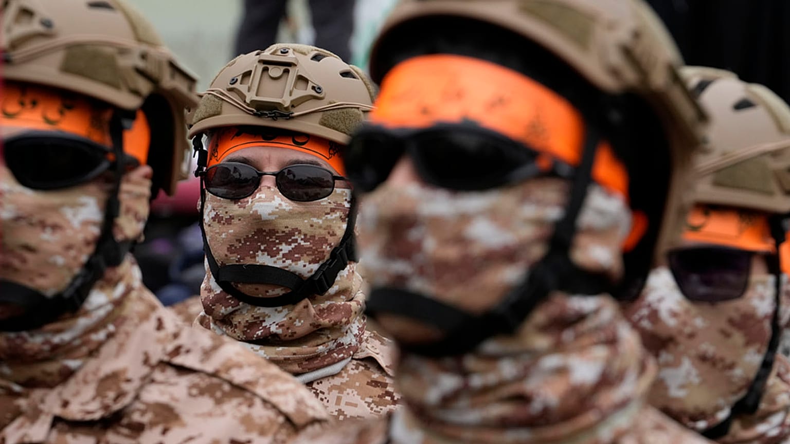 FILE: Members of the Iranian Basij paramilitary force attend the annual anti-Israeli Quds Day, or Jerusalem Day rally, in Tehran, 28 March 2025