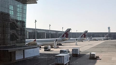 Qatar Airways planes parked at Hamad International Airport in Doha