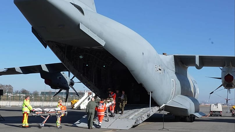 Injured soldiers are to arrive in Berlin by aeroplane to be redistributed and treated.