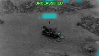 This partially redacted image from video provided by US Central Command shows a military vehicle in Iran shortly before it was struck by US, 2 March, 2026