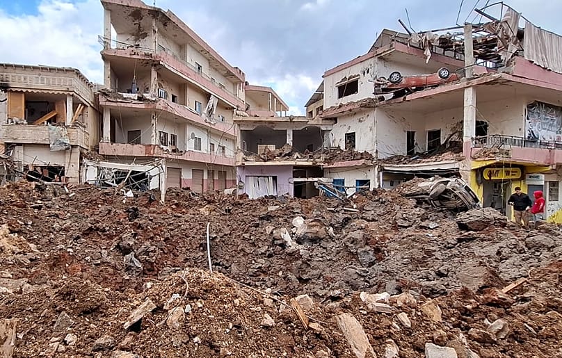 People check the damage left by Israeli airstrikes, Saturday, March 7, 2026, in the village of Nabi Chit, eastern Lebanon late Friday.