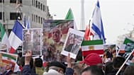 Protesters in Paris brandish portraits of the son of Iran’s last Shah, Reza Pahlavi, flags of the Iranian monarchy, and French and Israeli flags, 7 March, 2026.