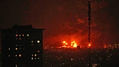 Flames rise from an oil storage facility south of the capital Tehran as strikes hit the city during the U.S.–Israel military campaign, Iran, Saturday, March 7, 2026.
