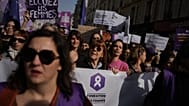 Gisele Pelicot, center, attends a march to mark International Women's Day in Paris, Sunday, March 8, 2026.