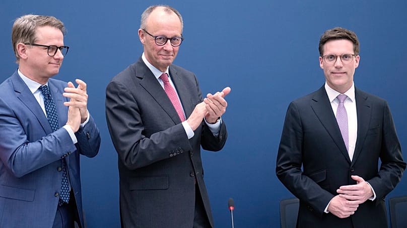 German Chancellor Friedrich Merz and Secretary General Carsten Linnemann applause candidate of the Baden-Wuerttemberg state election Manuel Hagel, Berlin. March 9. 2026.