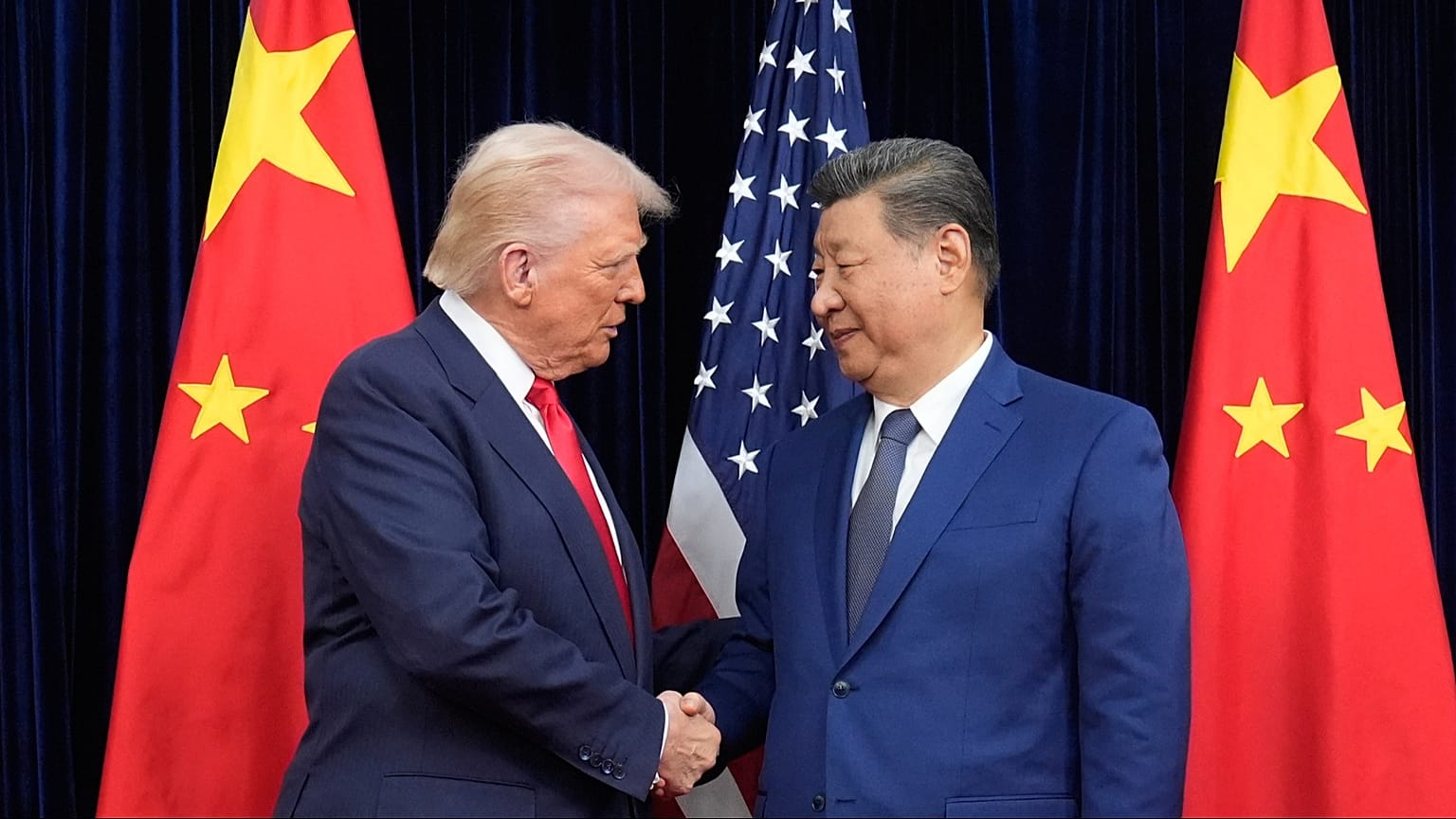 US President Donald Trump (R) and Chinese President Xi Jinping before their meeting at Gimhae International Airport in Busan, South Korea, Oct. 30, 2025. 