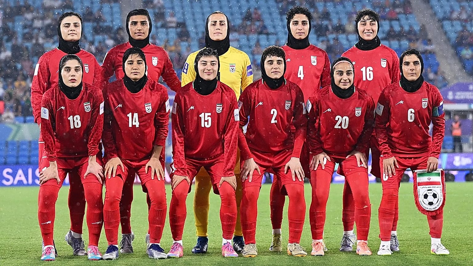 Iranian players pose for a team photo ahead of the Women's Asian Cup soccer match between Iran and the Philippines in Robina, 8 March, 2026
