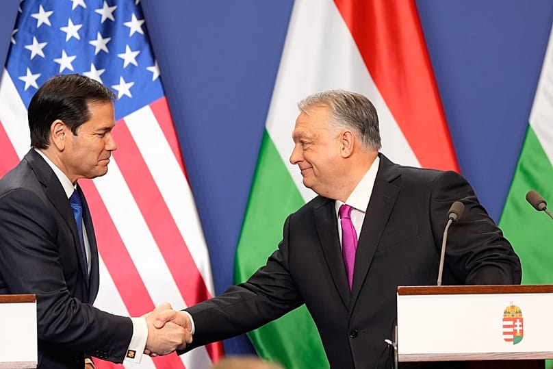 U.S. Secretary of State Marco Rubio shakes hands with Hungary's PM Viktor Orban on February 16, 2026.