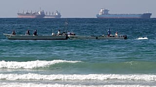 In this Jan. 19, 2012 file photo, fishing boats are seen in front of oil tankers south of the Strait of Hormuz, offshore the town of Ras Al Khaimah in United Arab Emirates