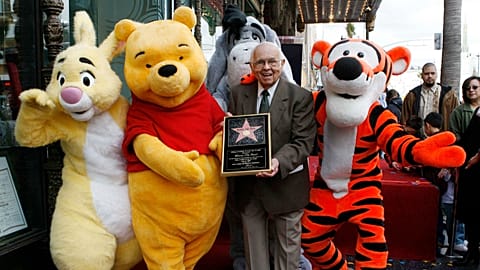 FILE: Johnny Grant, the honorary Mayor of Hollywood, poses with from left, Rabbit, Winnie the Pooh, Eeyore and Tigger during an LA ceremony 11 April 2006,