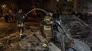Rescuers put out the fire at a residential neighbourhood following Russia's drone attack in Kharkiv, Ukraine, late Monday, 9 March, 2026.