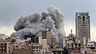  Photo search  FILE - A plume of smoke rises after a strike in Tehran, Iran, Monday, March 2, 2026