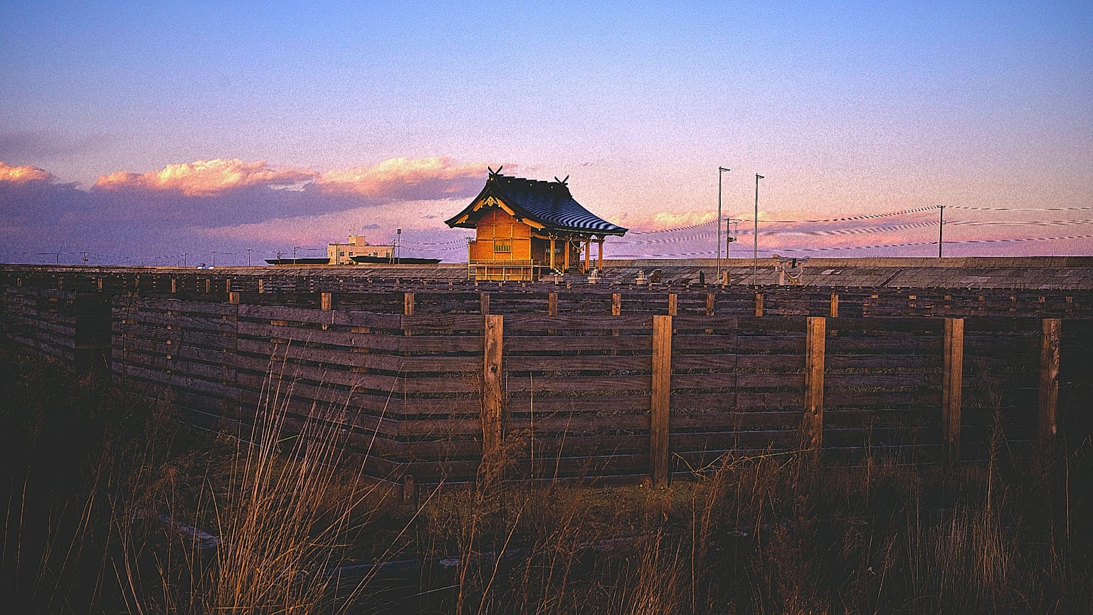 Kusano shrine, destroyed by the 2011 tsunami and later rebuilt, stands in fields in Namie, Fukushima Prefecture, Thursday, Feb. 12, 2026. 