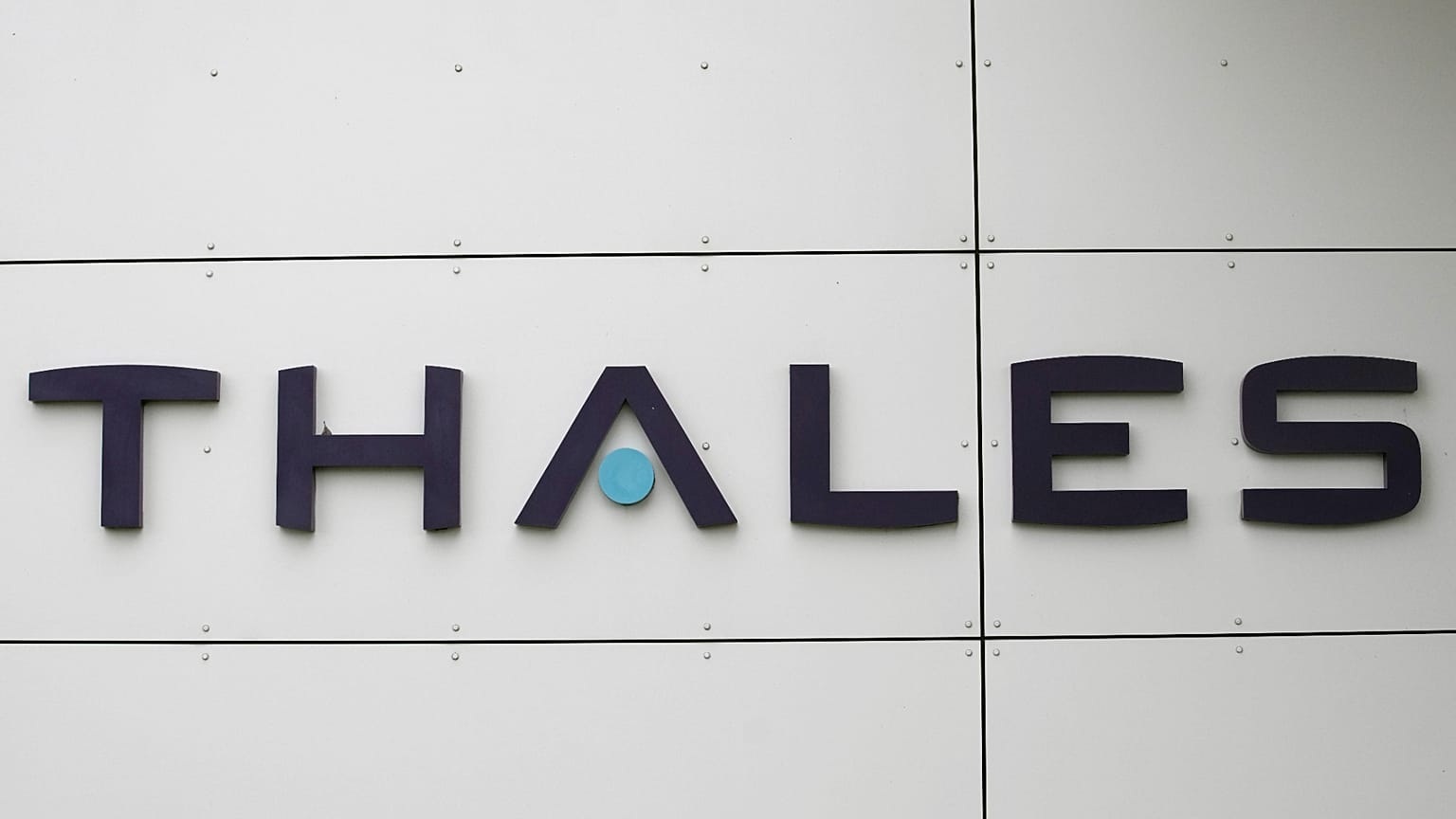 he logo of Thales is displayed during a visit at Thales radar factory by French Defense Minister Sebastien Lecornu and Ukrainian Minister of Defense Oleksii Reznikov, in Limou