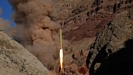 FILE: A Qadr H long-range ballistic surface-to-surface missile is fired by Iran's Revolutionary Guard during a manoeuvre in an undisclosed location in Iran, 9 March 2016