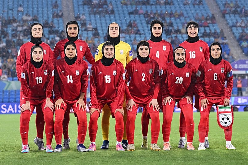 Iran players pose for a team photo ahead of the Women's Asian Cup soccer match between Iran and the Philippines in Robina, 8 March, 2026