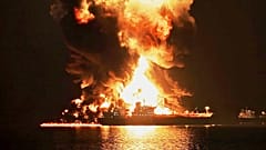 An oil tanker burns after being hit by an Iranian strike in the ship-to-ship transfer zone at Khor al-Zubair port near Basra, Iraq, 11 March 2026