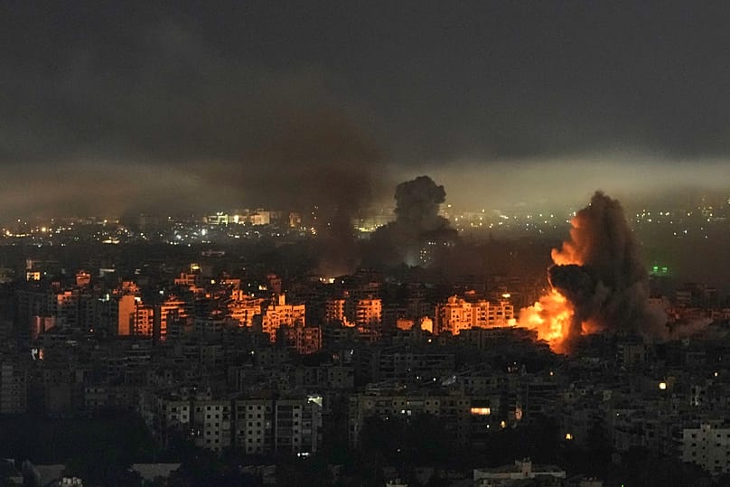 Smoke and flame rise from buildings following an Israeli airstrike in Dahiyeh, Beirut's southern suburbs, Lebanon, Wednesday, March 11, 2026. 