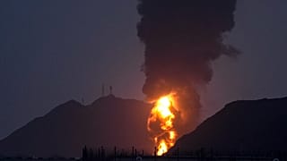 Large fire after debris of an Iranian intercepted drone hit the Fujairah oil facility, UAE, 3 March 2026