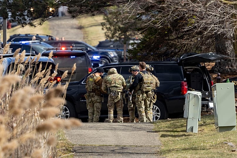 Police respond to the scene of a shooting and vehicle attack near Temple Israel in West Bloomfield, Mich., on Thursday, March 12, 2026.