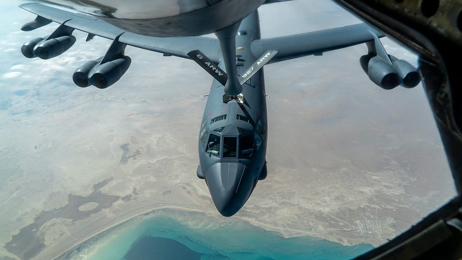 FILE: A US Air Force B-52H “Stratofortress” is refuelled by a KC-135 “Stratotanker” in the US Central Command area of responsibility above Iran, 30 December 2020