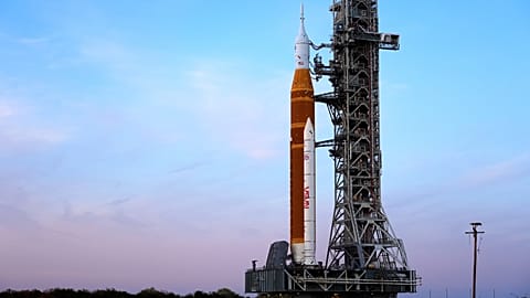 NASA's Artemis II SLS (Space Launch System) moon rocket with the Orion spacecraft slowly rolls back towards the Vehicle Assembly Building at the Kennedy Space Center.