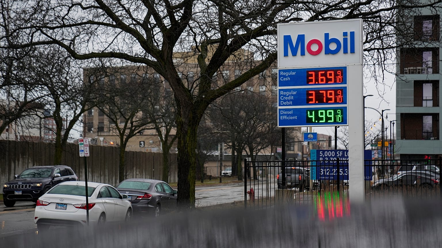 Gas prices are displayed at a station Wednesday, March 11, 2026, in Evanston Ill.