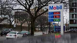 Gas prices are displayed at a station Wednesday, March 11, 2026, in Evanston Ill.