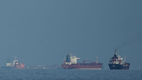 Oil tankers and cargo ships line up in the Strait of Hormuz, 11 March 2026
