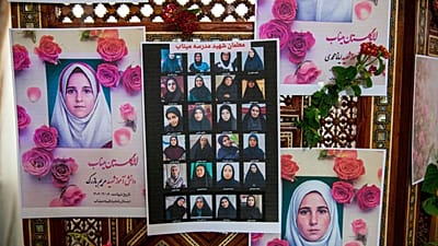 Portraits of school children from the Shajarah Tayyebeh primary school who were killed in an airstrike are shown in Tunis, Tunisia, Thursday 12 March 2026.
