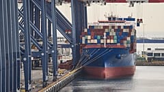 File - A container ship is docked at the Port of Long Beach, Calif., USA. 20 February 2026