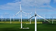 Wind turbines operate on a wind farm near Aschersleben, Germany, Monday, May 26, 2025. 