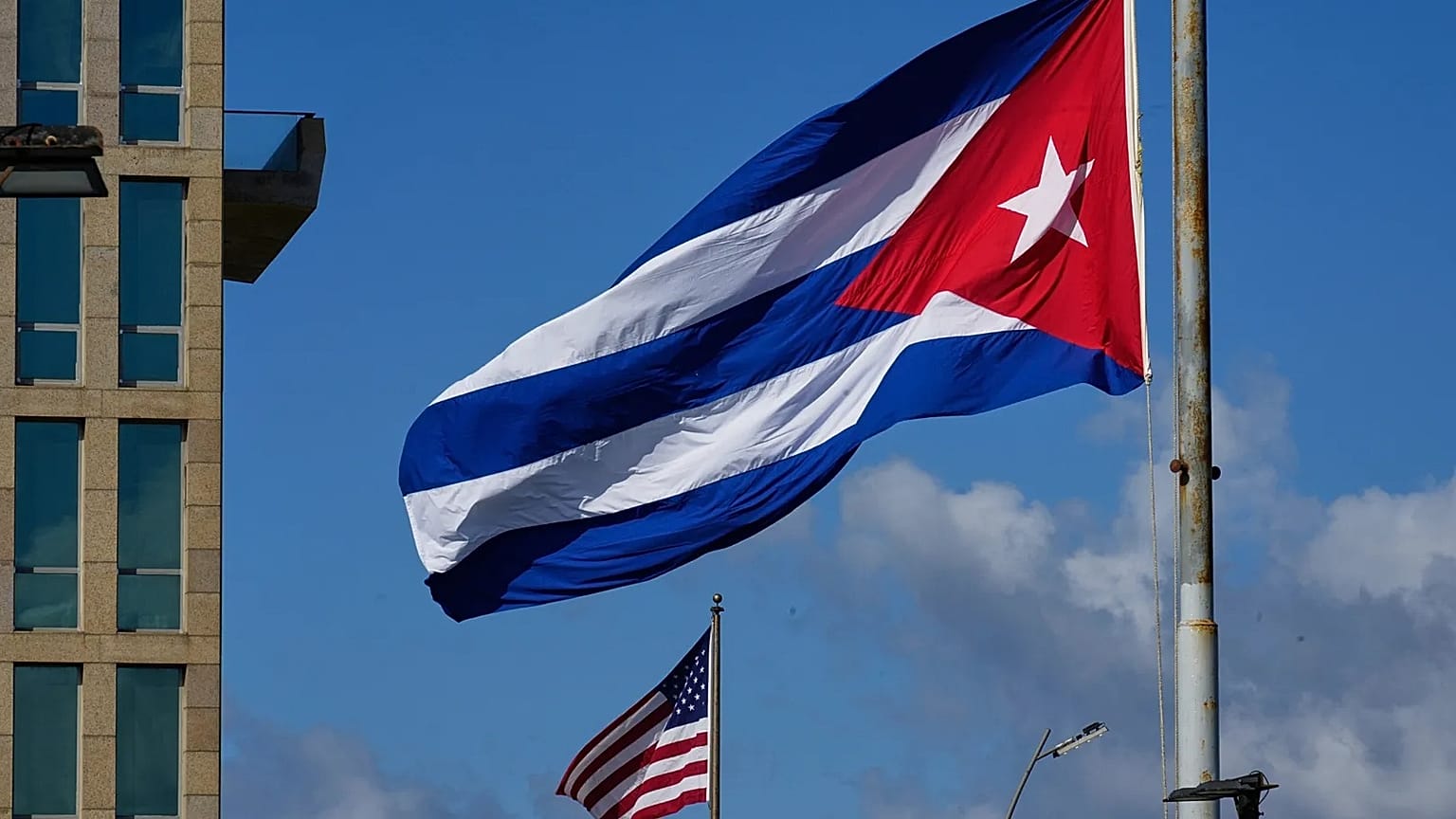 FILE: The Cuban flag flies at the Anti-Imperialist Tribune near the US embassy in Havana, 5 January 2026