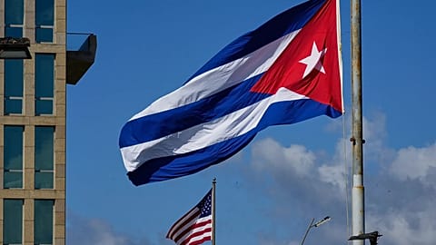 FILE: The Cuban flag flies at the Anti-Imperialist Tribune near the US embassy in Havana, 5 January 2026