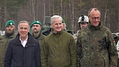 From left: Canadian Prime Minister Mark Carney, Norwegian Prime Minister Jonas Gahr Støre and German Chancellor Friedrich Merz in Norway on 13 March 2026.