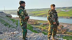 أعضاء من حزب حرية كردستان (PAK) يقفون حراسة في أربيل، العراق، يوم الخميس 5 آذار/مارس 2026.