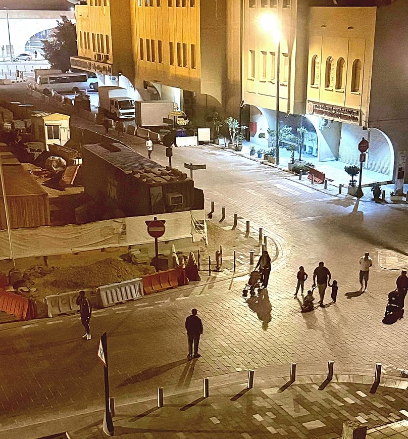 Families move away from parts of Msheireb in Doha around 2:00am after authorities restricted access to the area.